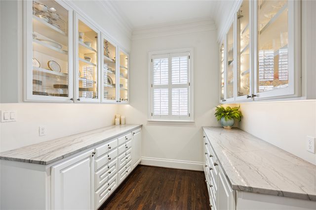 a bathroom with a sink and a window