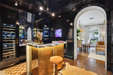 a living room with a couch and chairs