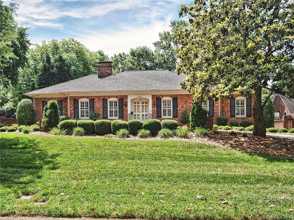 3123 Cloverfield Road Charlotte, NC 28211 - Photo 1 of 24 a front view of a house with a yard