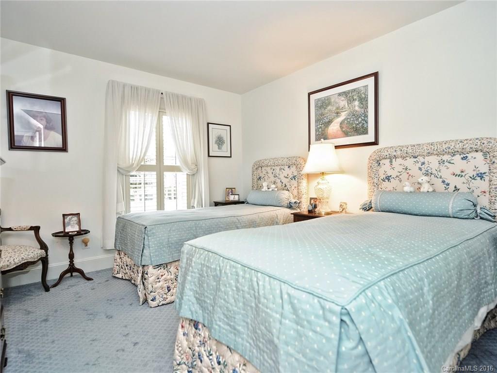 3123 Cloverfield Road Charlotte, NC 28211 - Photo 15 of 24 a bedroom with a bed and a couch