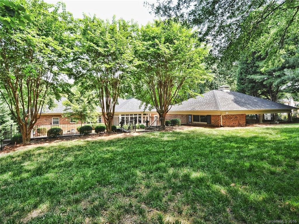 3123 Cloverfield Road Charlotte, NC 28211 - Photo 20 of 24 a view of a house with backyard and sitting area