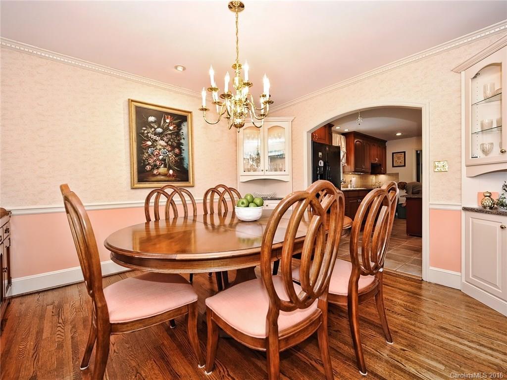3123 Cloverfield Road Charlotte, NC 28211 - Photo 4 of 24 a view of a dining room with furniture window and wooden floor