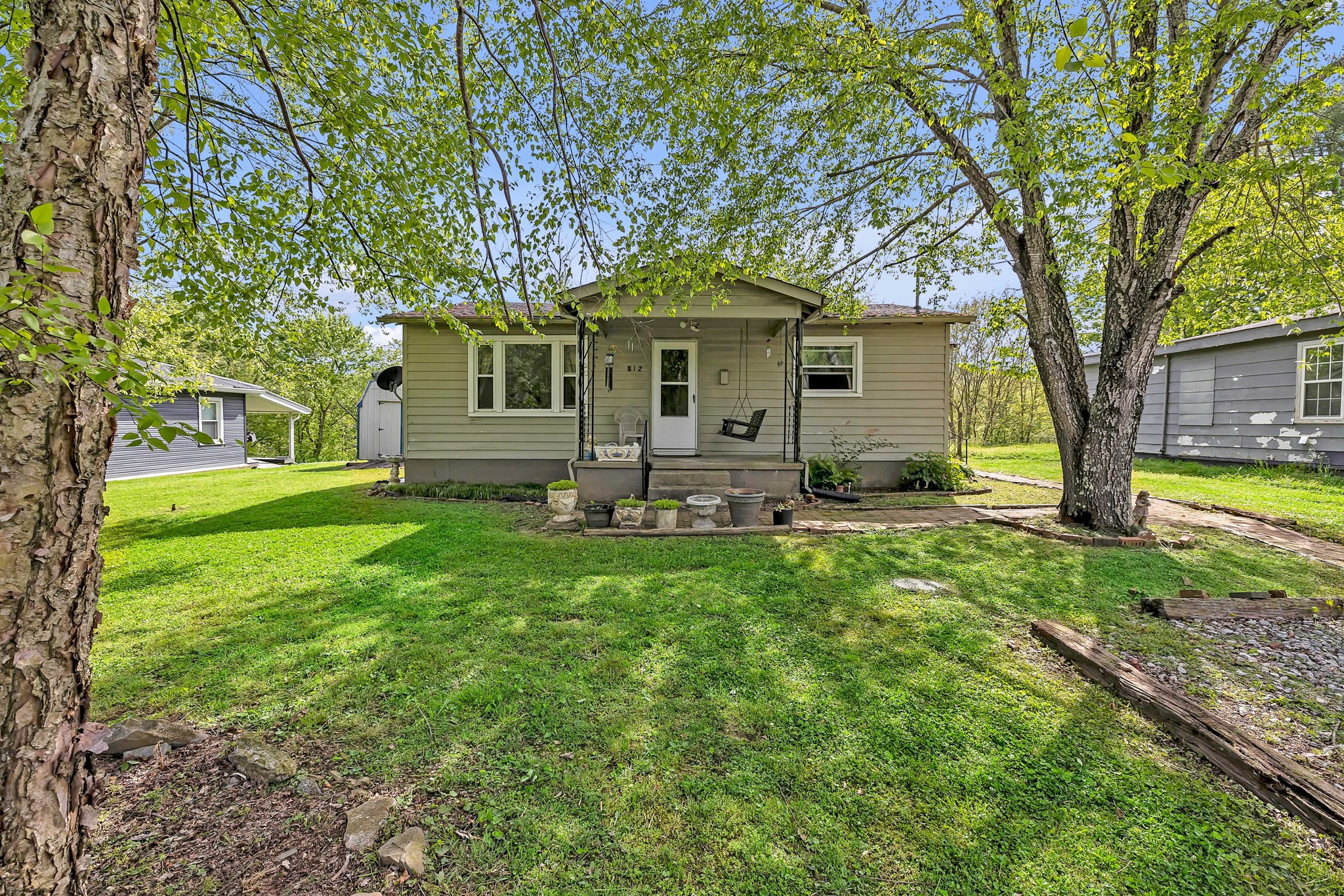 812 Upper Ferry Road Carthage, TN 37030 - Photo 2 of 25 a front view of house with yard and green space