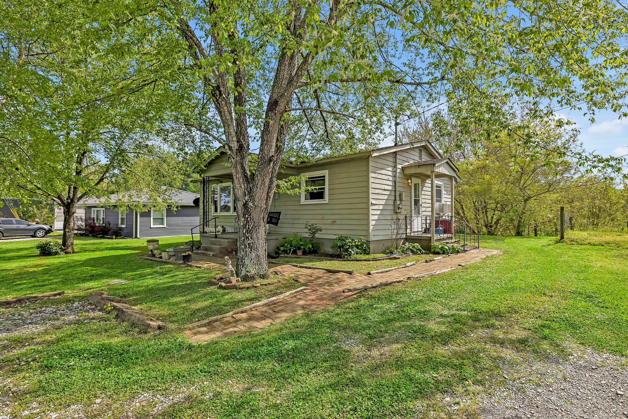 812 Upper Ferry Road Carthage, TN 37030 - Photo 3 of 25 a view of a house with yard and tree s