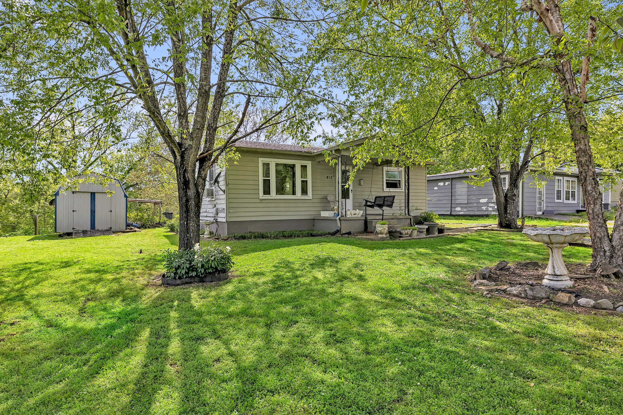 812 Upper Ferry Road Carthage, TN 37030 - Photo 4 of 25 a front view of house with yard and green space