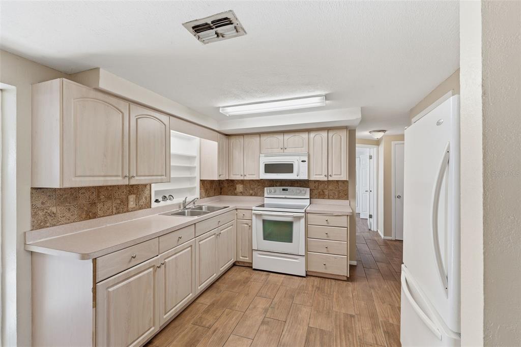 10814 Fillmore Avenue Port Richey, FL 34668 - Photo 9 of 24 Gallery Image 9