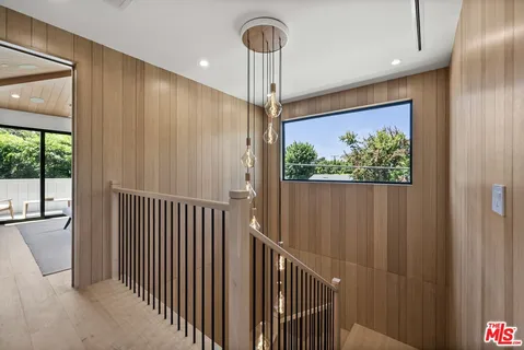 a view of a hallway with a porch