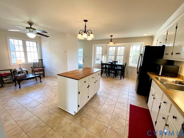 3151 Benchmark Trail Amelia Court House, VA 23002 - Photo 17 of 50 a living room with furniture and a chandelier