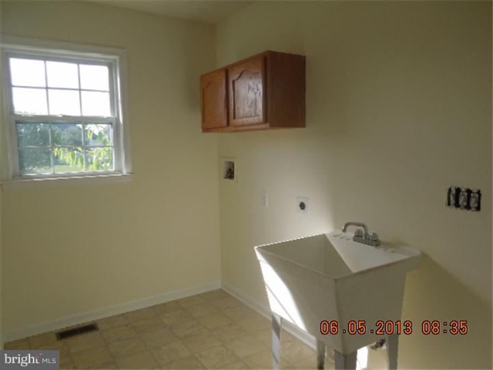 6374 Pearsons Corner Road Dover, DE 19904 - Photo 18 of 18 Laundry Room