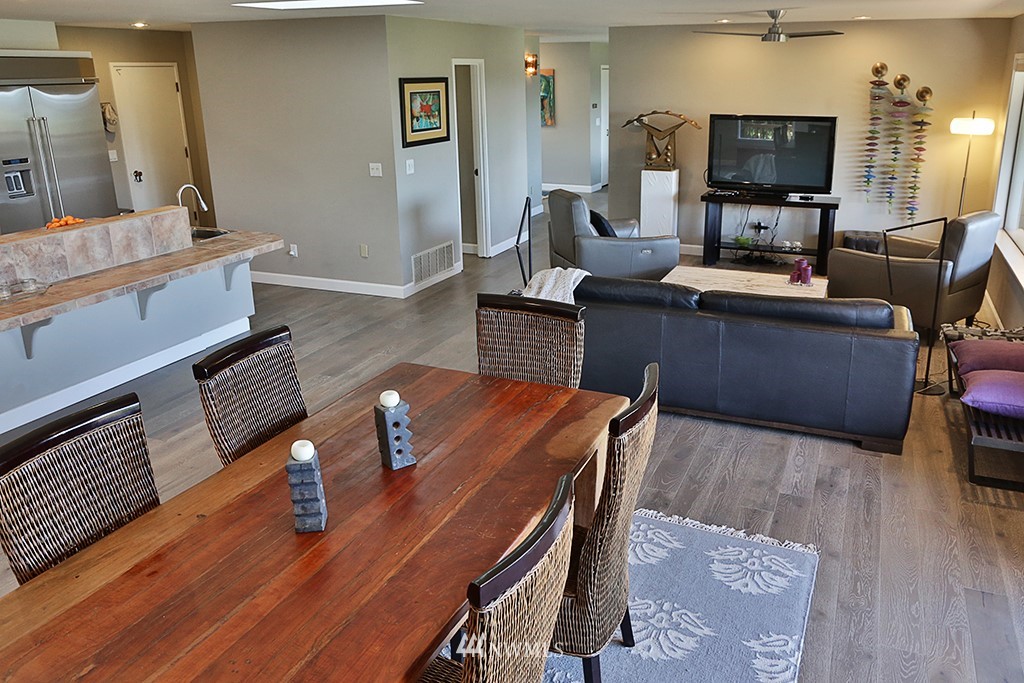 1835 Lancaster Road Freeland, WA 98249 - Photo 13 of 25 a living room with furniture and a flat screen tv
