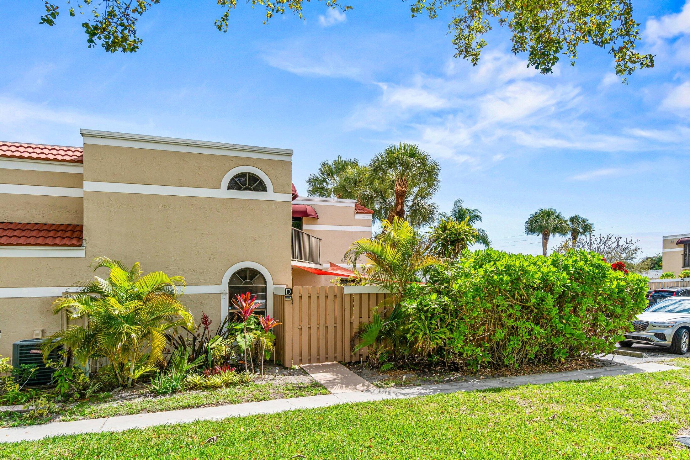 3900 Village Drive, Unit D Delray Beach, FL 33445 - Photo 2 of 43 West facing entrance