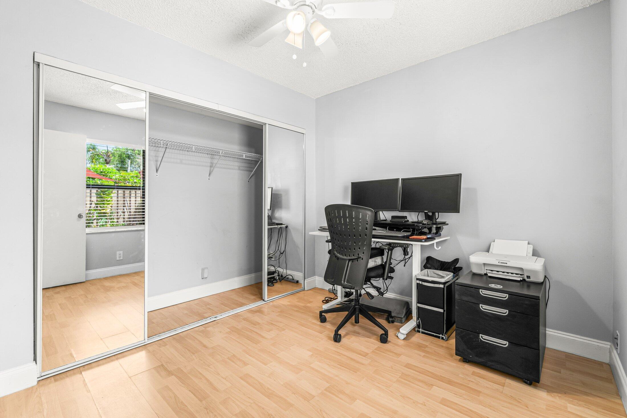 3900 Village Drive, Unit D Delray Beach, FL 33445 - Photo 21 of 43 First floor bedroom with closet