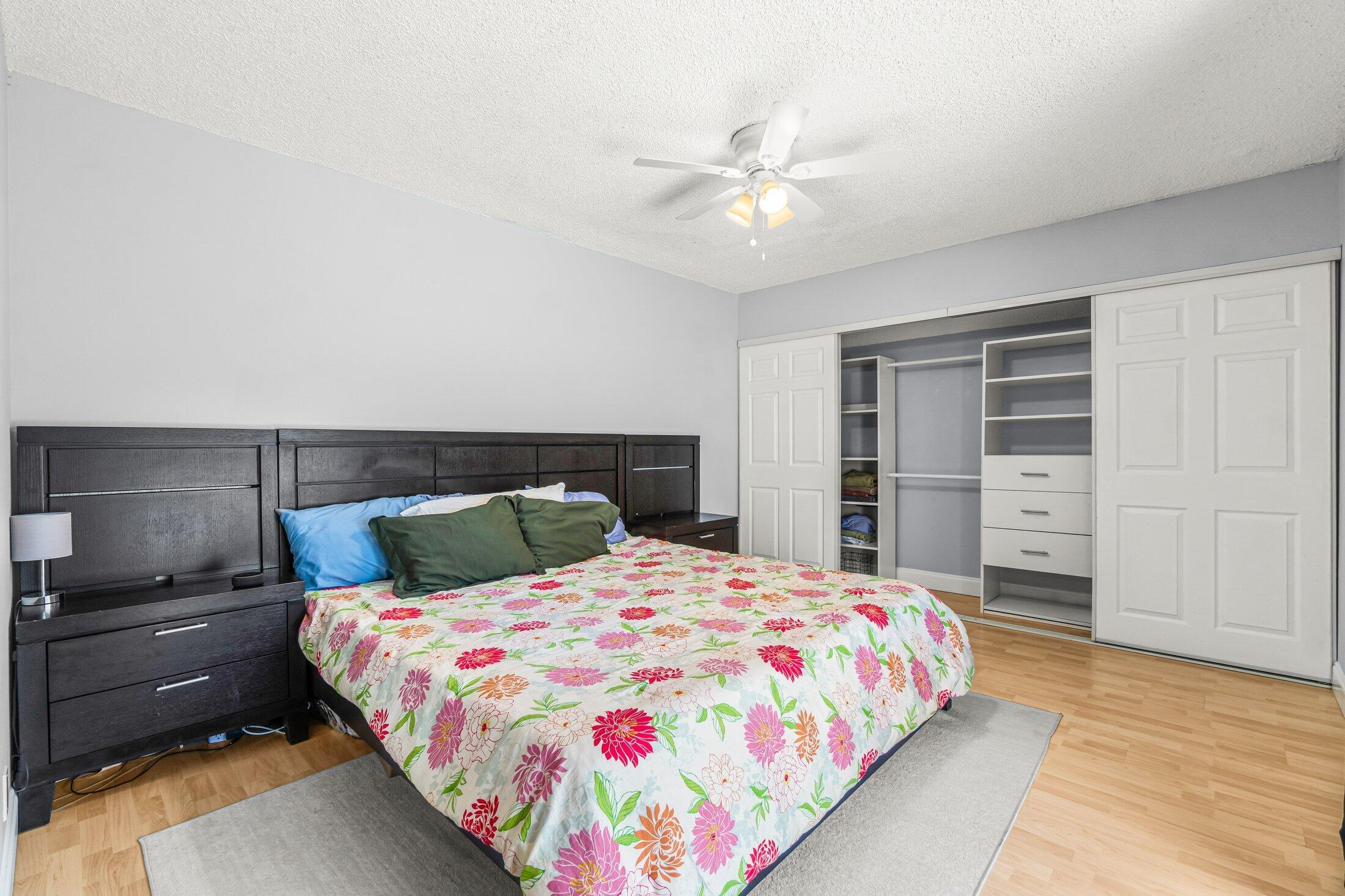 3900 Village Drive, Unit D Delray Beach, FL 33445 - Photo 24 of 43 Second floor primary with closets