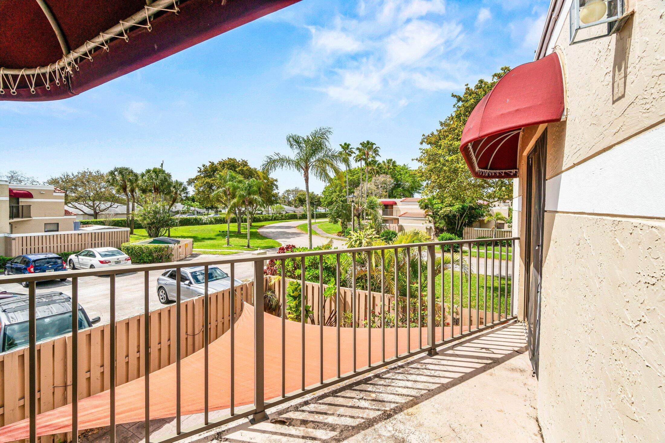 3900 Village Drive, Unit D Delray Beach, FL 33445 - Photo 26 of 43 Second floor balcony with SE view
