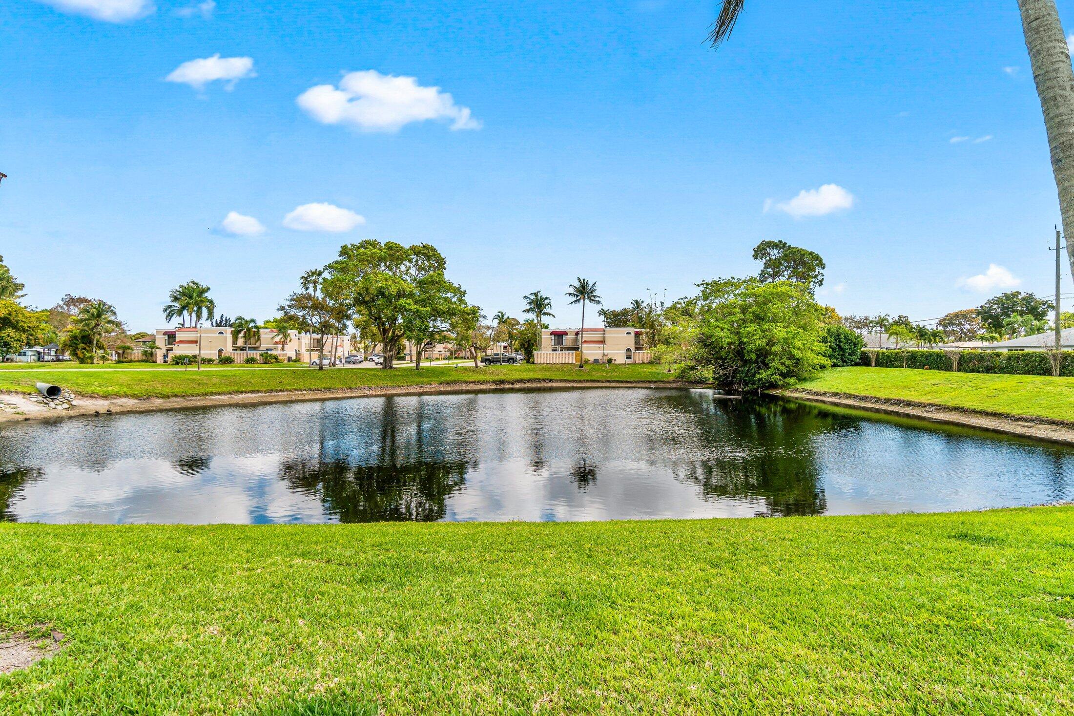 3900 Village Drive, Unit D Delray Beach, FL 33445 - Photo 33 of 43 Lake at end of the cul-de-sac