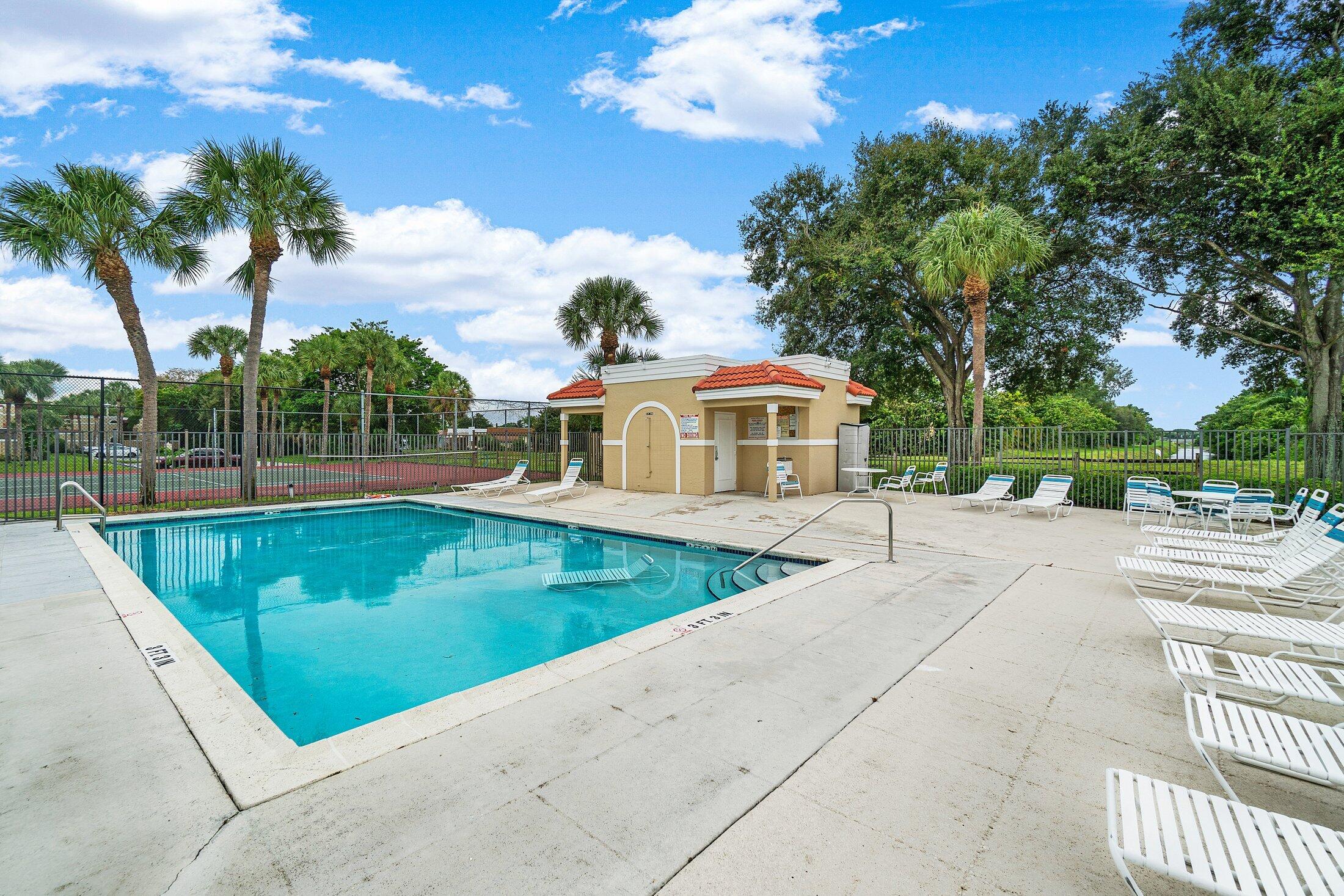3900 Village Drive, Unit D Delray Beach, FL 33445 - Photo 41 of 43 Pool # 1 next to tennis court