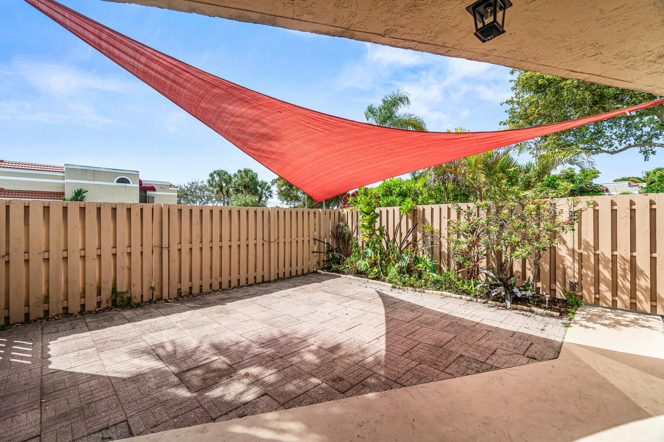 3900 Village Drive, Unit D Delray Beach, FL 33445 - Photo 5 of 43 Courtyard facing SW