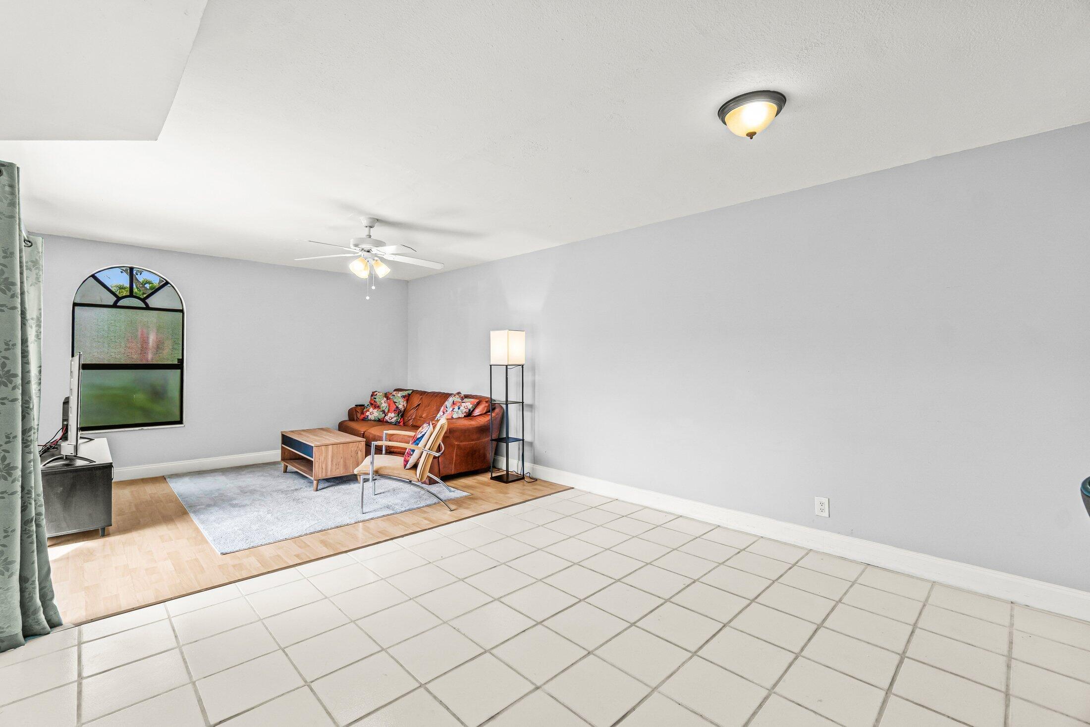 3900 Village Drive, Unit D Delray Beach, FL 33445 - Photo 9 of 43 Living dining area