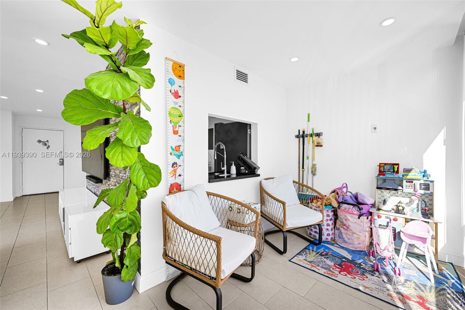 9441 Southwest 4th Street, Unit 309 Miami, FL 33174 - Photo 31 of 44 a living room filled with furniture