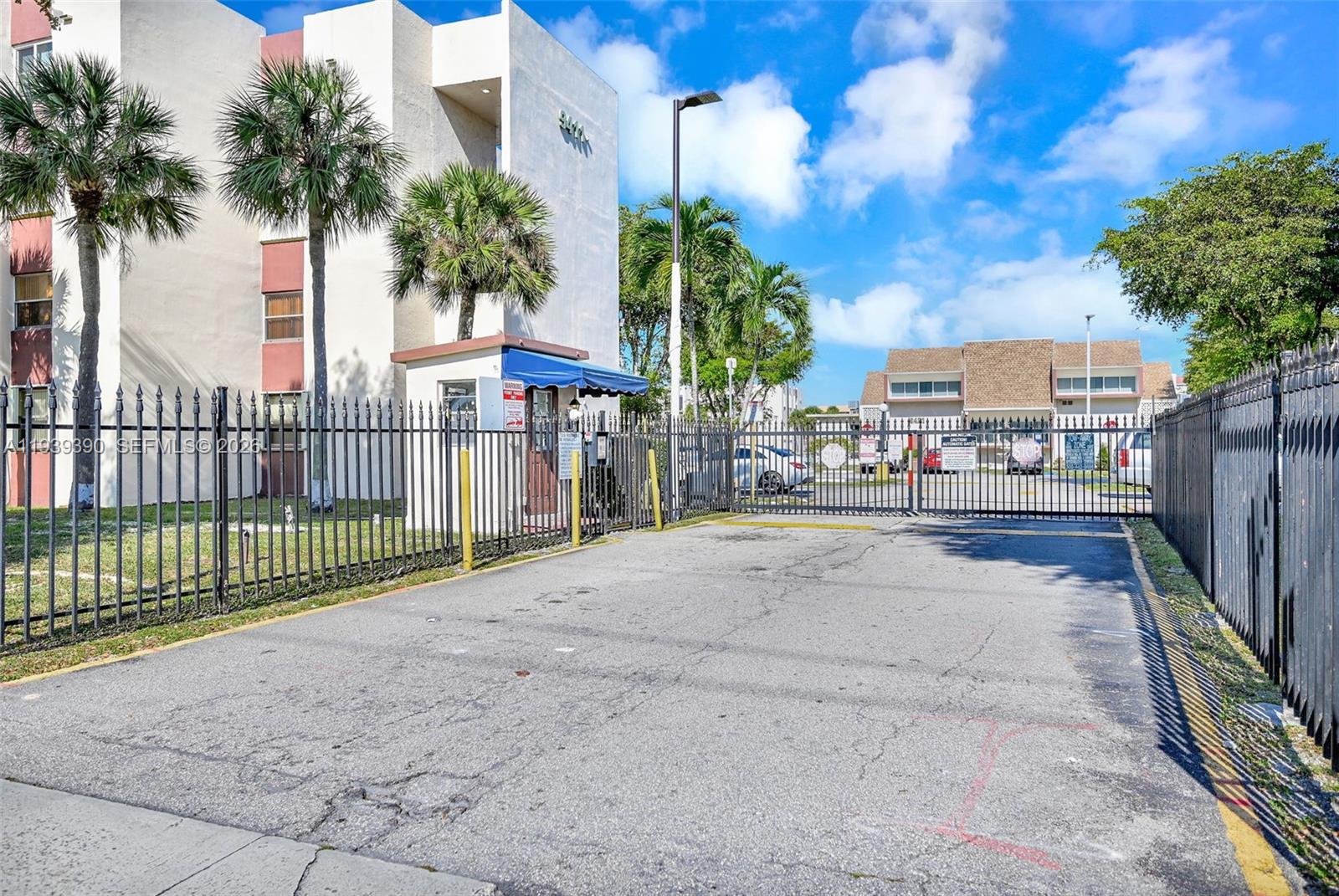 9441 Southwest 4th Street, Unit 309 Miami, FL 33174 - Photo 36 of 44 a view of a street with a building in the background