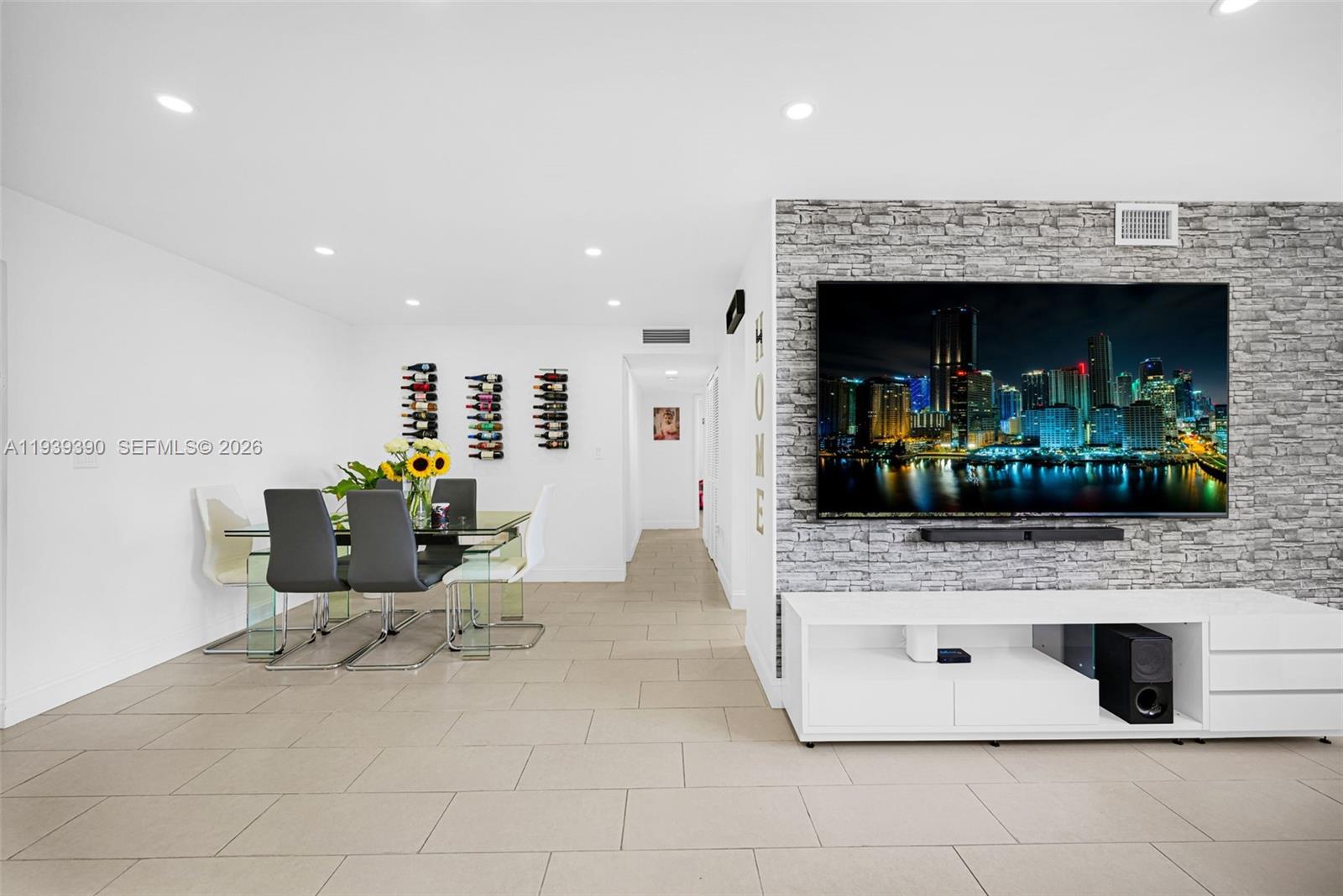 9441 Southwest 4th Street, Unit 309 Miami, FL 33174 - Photo 10 of 44 a view of living room with furniture and fireplace
