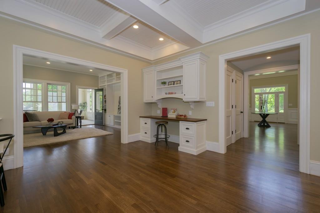 291 Emerson Road Lexington, MA 02420 - Photo 12 of 42 a living room with furniture and a wooden floor