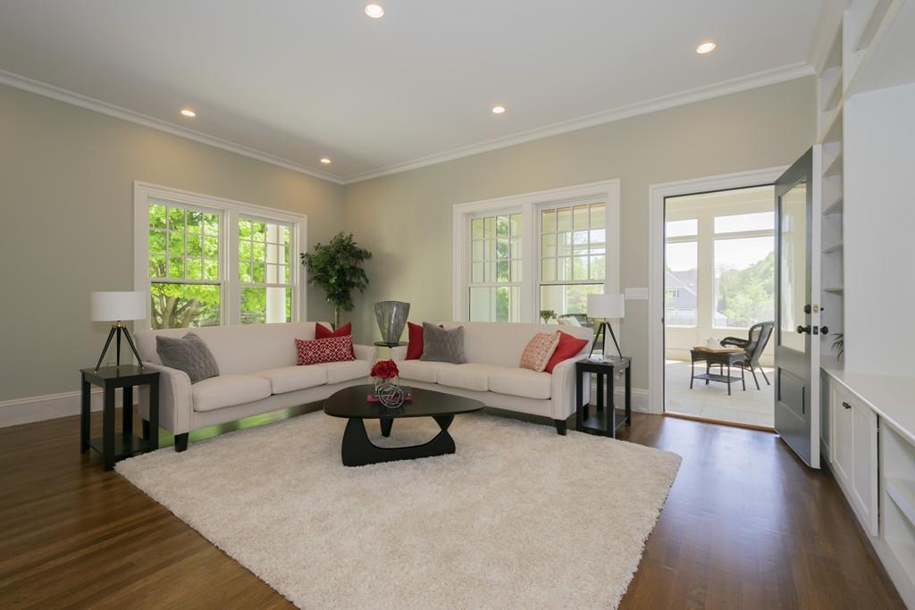 291 Emerson Road Lexington, MA 02420 - Photo 18 of 42 a living room with furniture and a large window