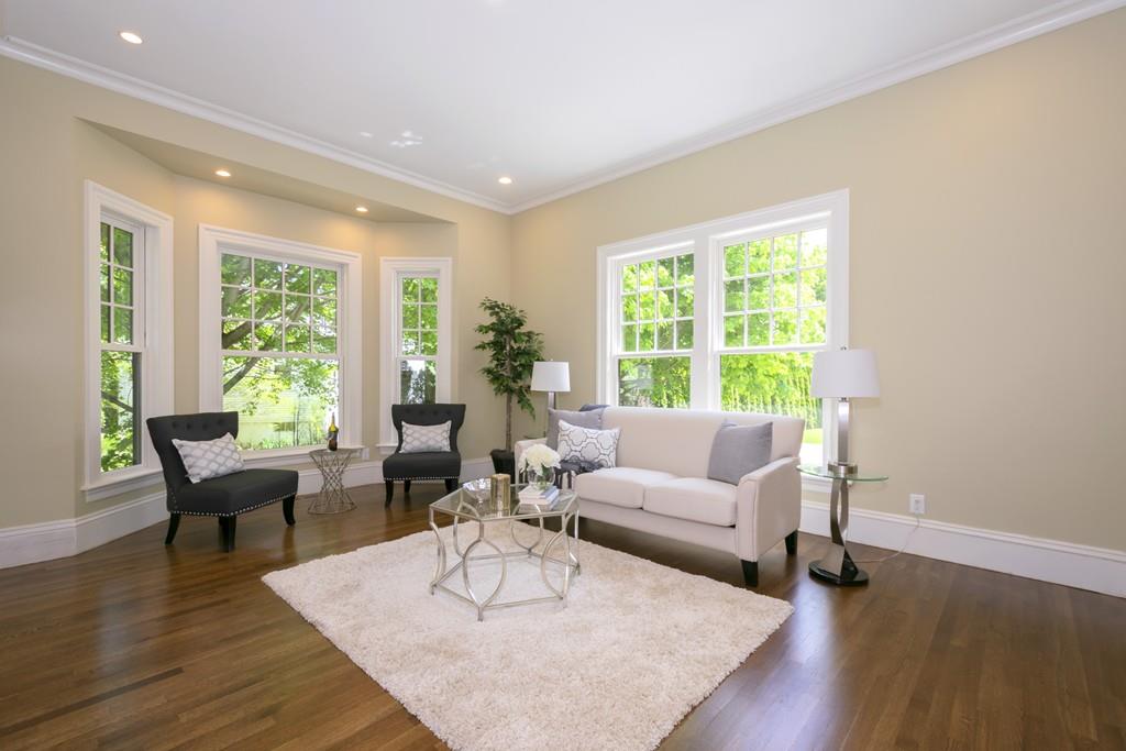 291 Emerson Road Lexington, MA 02420 - Photo 22 of 42 a living room with furniture and a large window