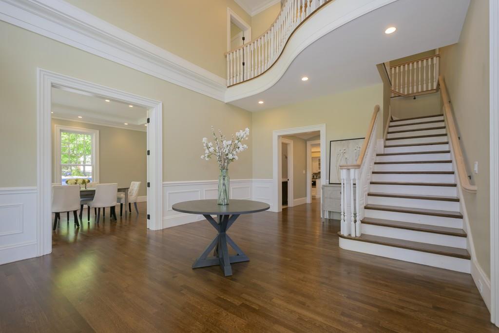 291 Emerson Road Lexington, MA 02420 - Photo 3 of 42 an open space with lots of furniture and wooden floor