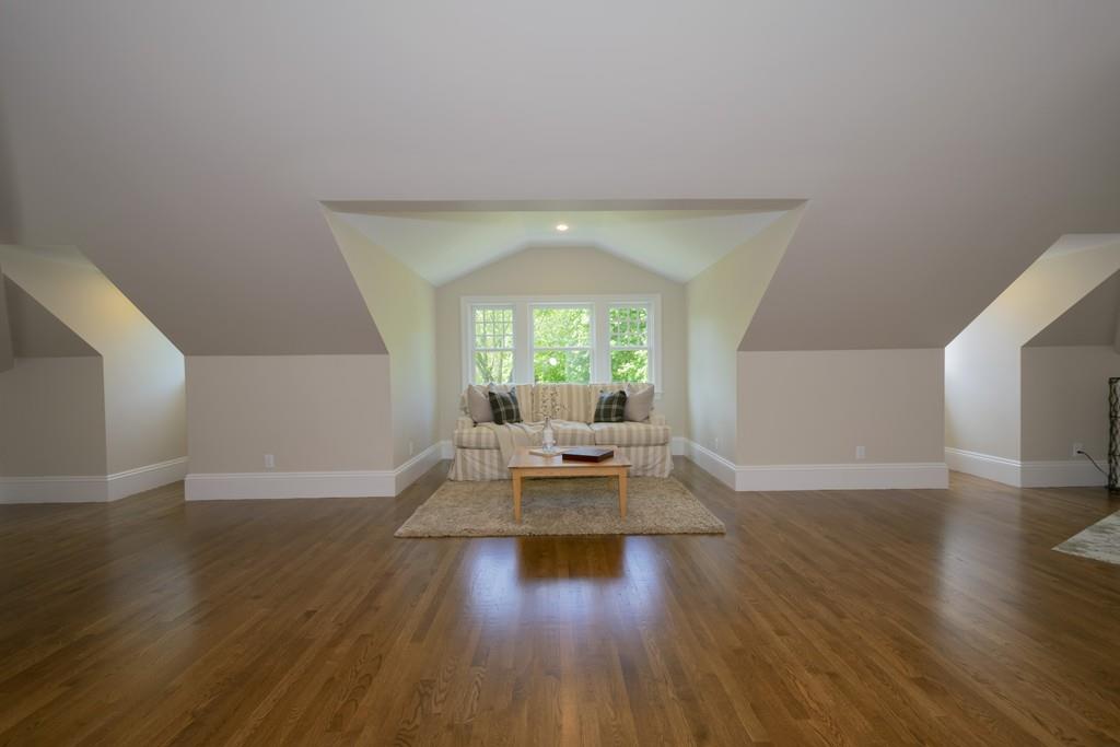 291 Emerson Road Lexington, MA 02420 - Photo 33 of 42 a view of a livingroom with wooden floor and furniture