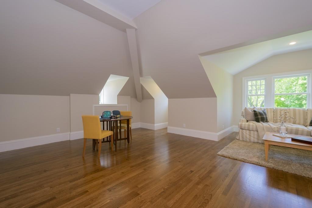 291 Emerson Road Lexington, MA 02420 - Photo 35 of 42 a living room with furniture and a wooden floor