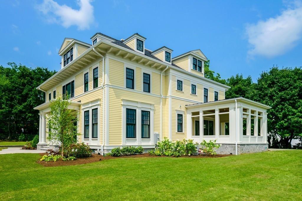 291 Emerson Road Lexington, MA 02420 - Photo 39 of 42 a front view of a house with a garden