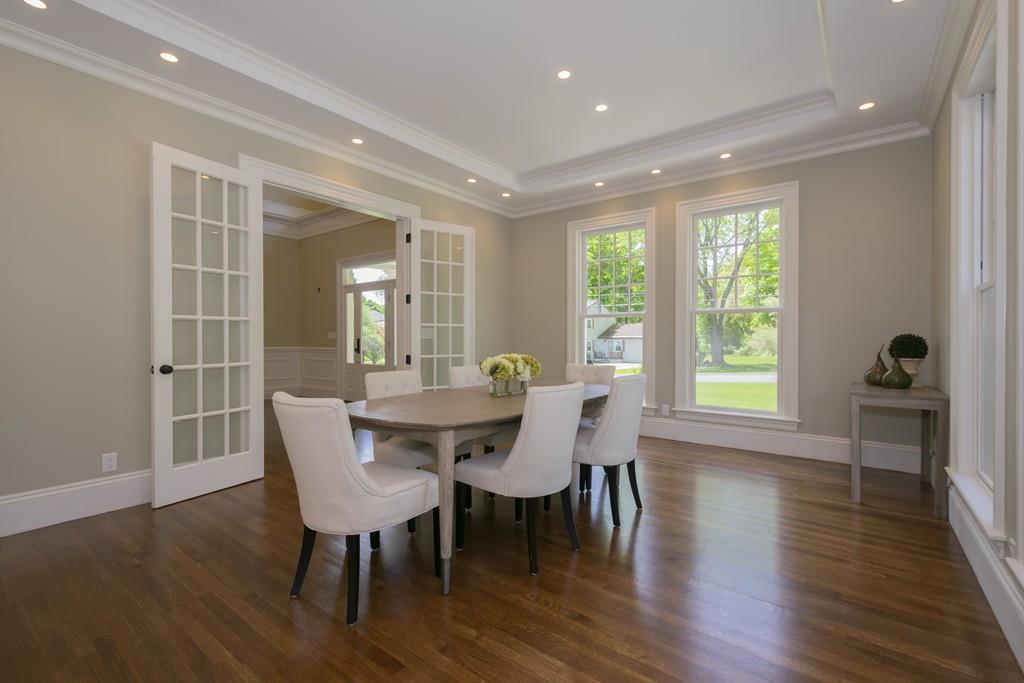 291 Emerson Road Lexington, MA 02420 - Photo 5 of 42 a view of a dining room with furniture and wooden floor