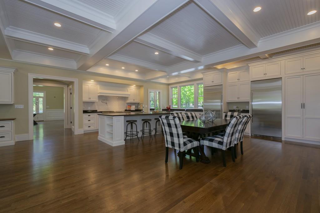 291 Emerson Road Lexington, MA 02420 - Photo 7 of 42 a dining room with furniture and wooden floor