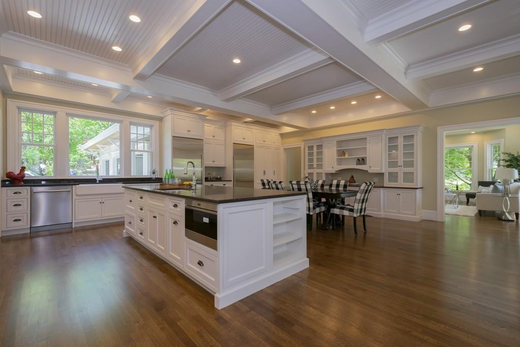 291 Emerson Road Lexington, MA 02420 - Photo 8 of 42 a kitchen with lots of counter top space and dining table