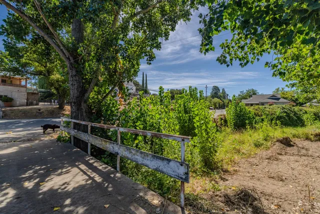 a view of a pathway with a bench