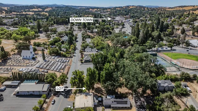 an aerial view of a house with a garden