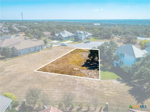 a view of balcony with a couple of chairs