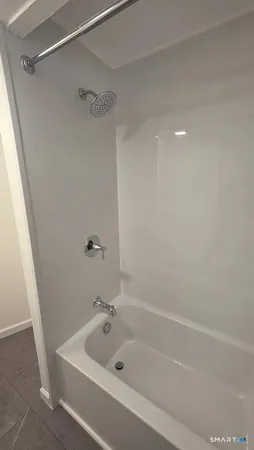 a bathroom with a bathtub