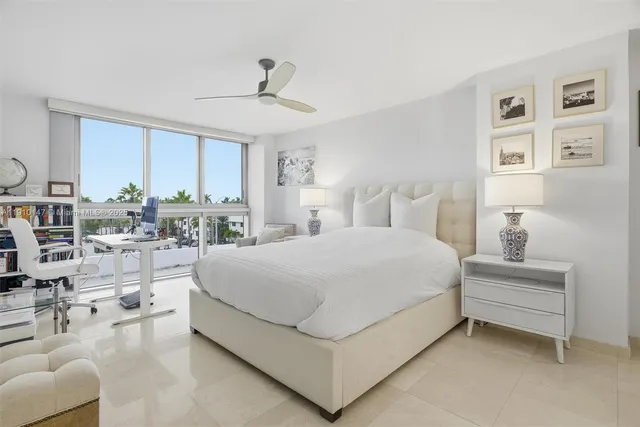 a bed room with a bed and a couch