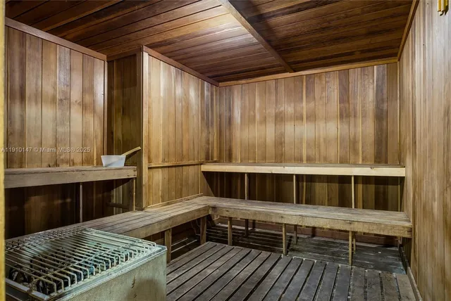 a room with furniture and pool table