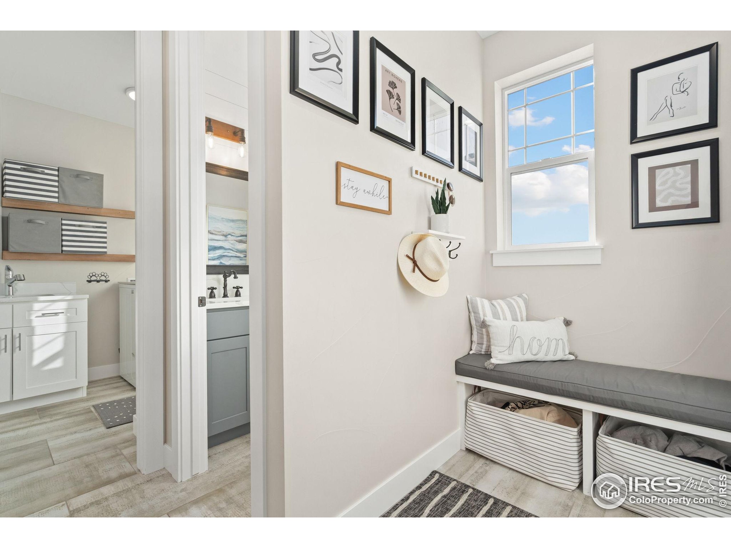 2032 Cuda Court Berthoud, CO 80513 - Photo 18 of 38 a view of an entryway and wooden floor