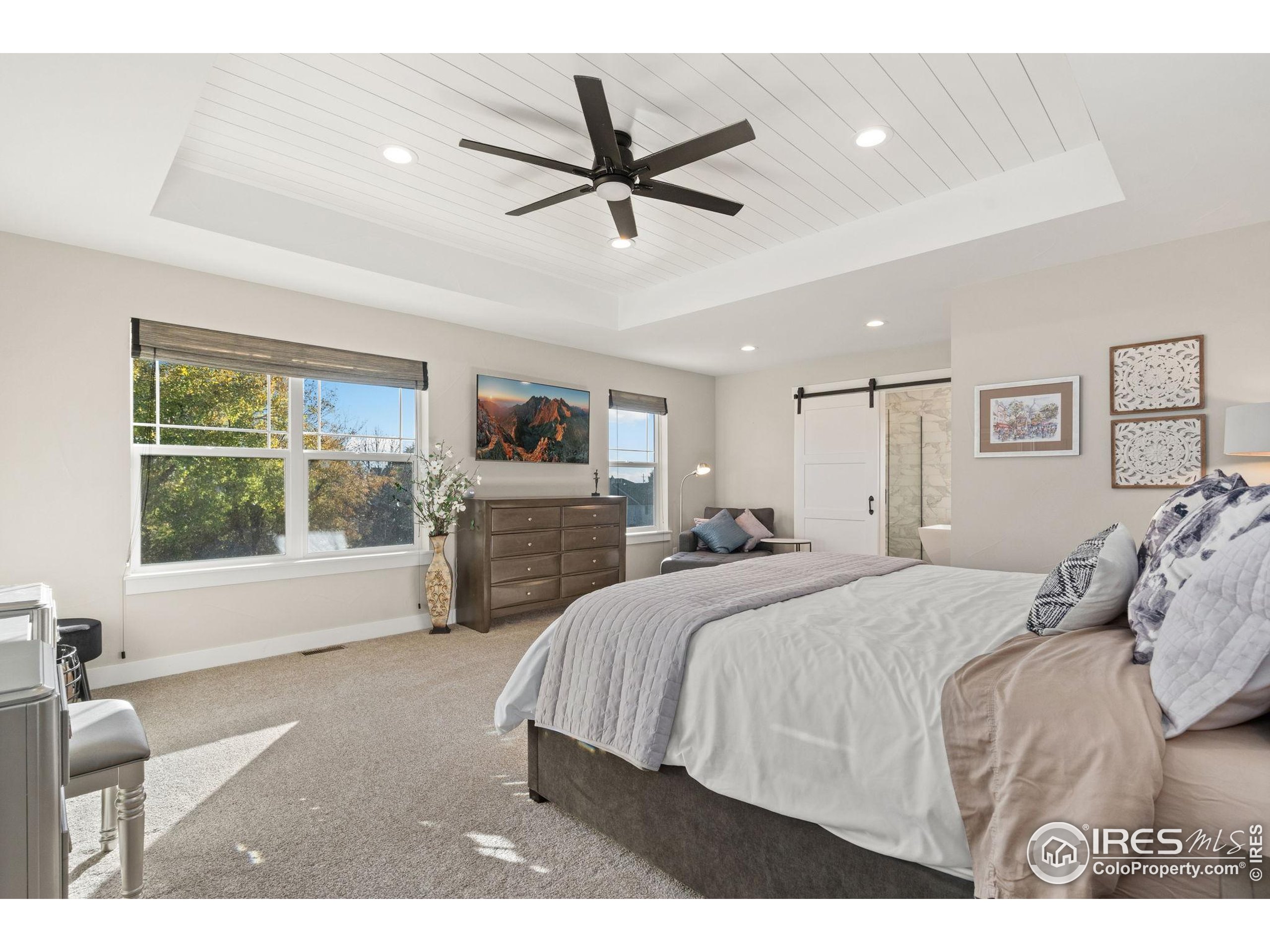 2032 Cuda Court Berthoud, CO 80513 - Photo 21 of 38 a bed room with a bed and a window