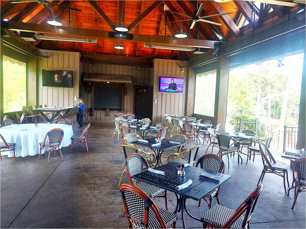 26 Chestnut Oak Point Jasper, GA 30143 - Photo 11 of 32 a view of a dining room with furniture window and outside view