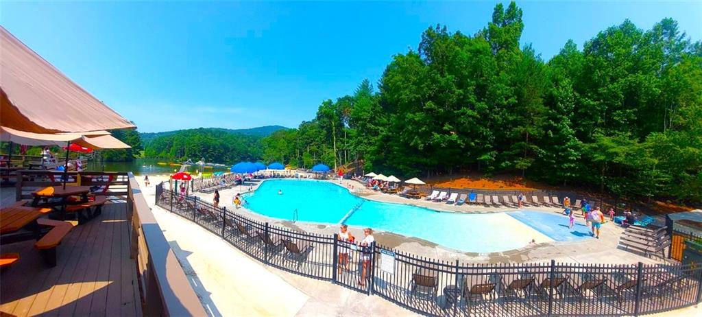 26 Chestnut Oak Point Jasper, GA 30143 - Photo 19 of 32 an outdoor space with seating area and swimming pool