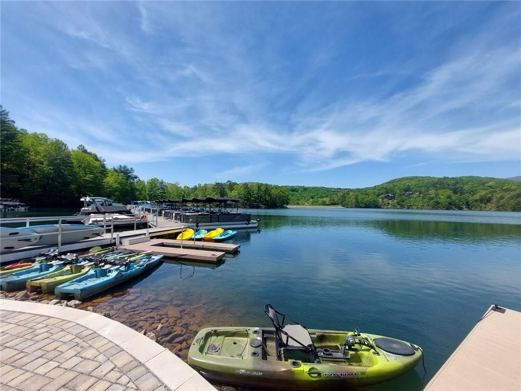 26 Chestnut Oak Point Jasper, GA 30143 - Photo 26 of 32 a lake view with a table and a chairs