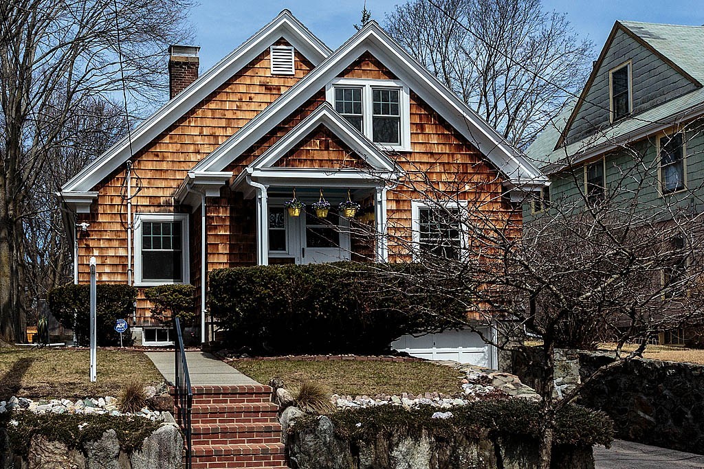 29 Ware Road Newton, MA 02466 - Photo 1 of 25 a front view of a house with a yard