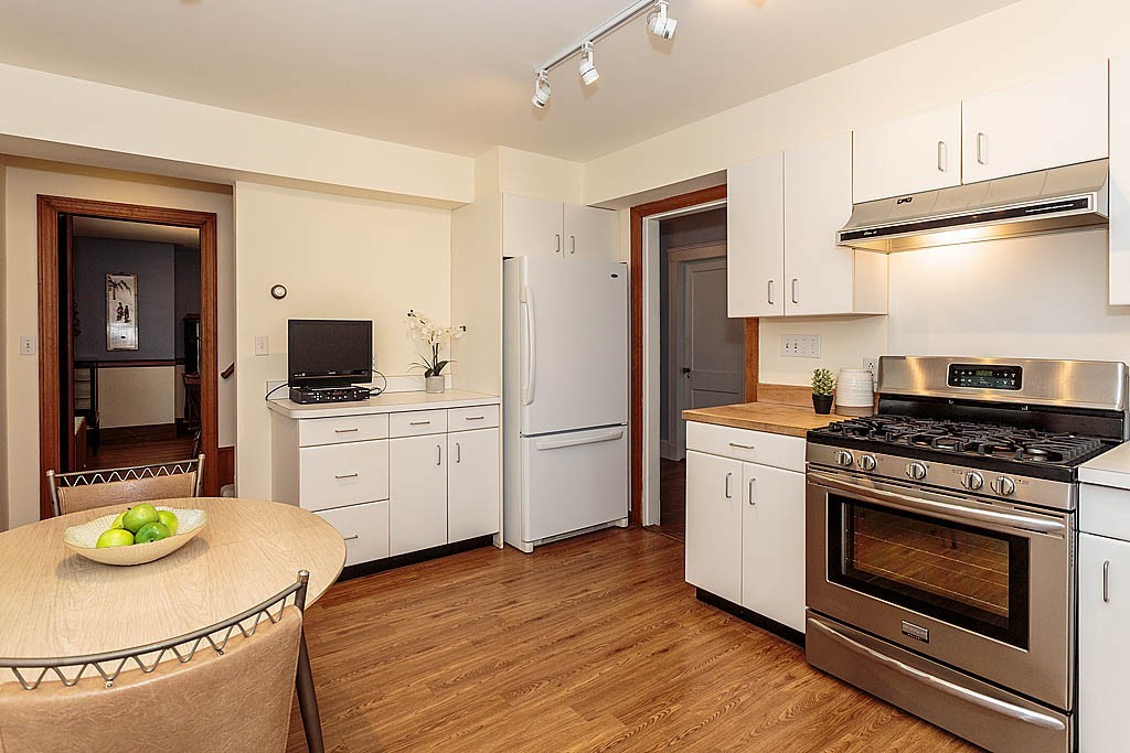 29 Ware Road Newton, MA 02466 - Photo 11 of 25 a kitchen with a stove and a microwave