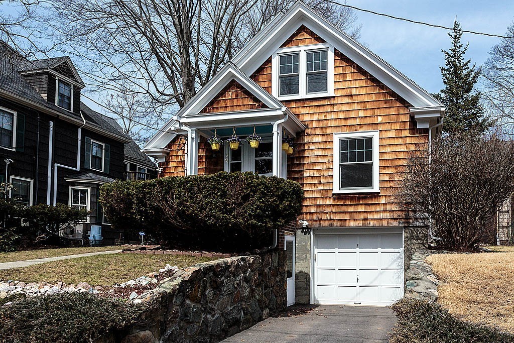 29 Ware Road Newton, MA 02466 - Photo 25 of 25 a front view of a house with a yard