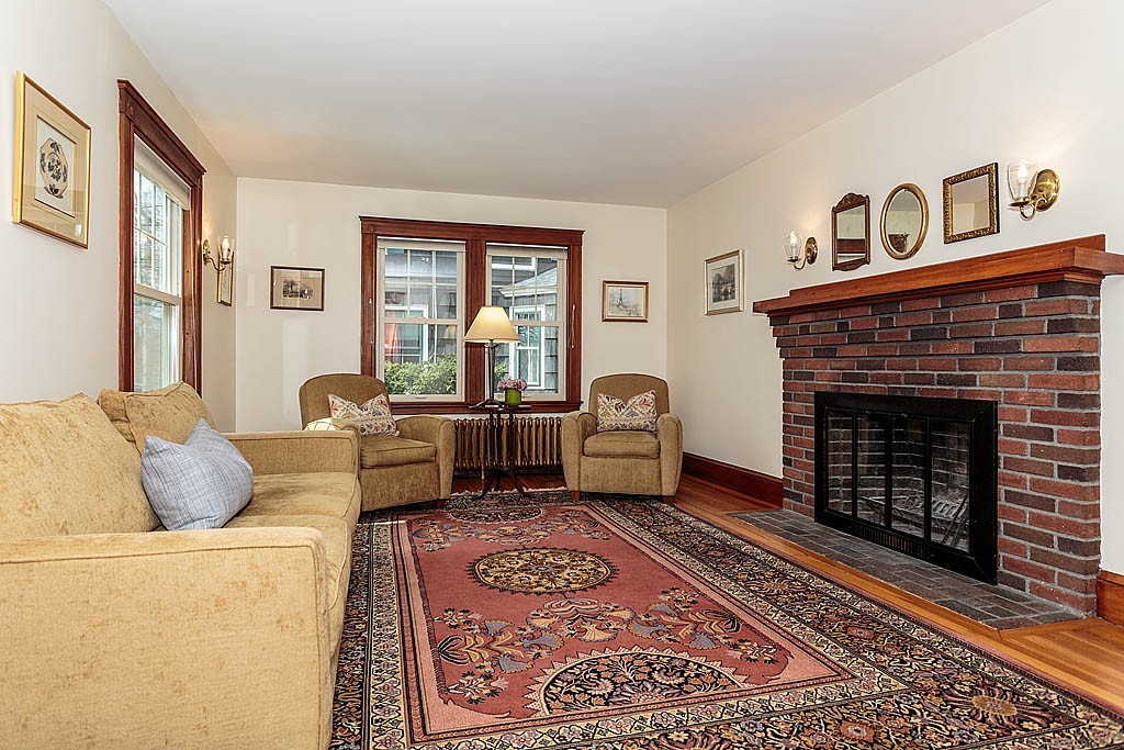 29 Ware Road Newton, MA 02466 - Photo 4 of 25 a living room with furniture and a fireplace
